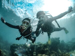 underwater shot of two people diving 2026 01 06 10 54 45 utc (1)
